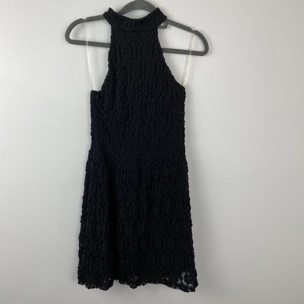 Mystic, Black stretchy lace sleeveless chocker style dress.